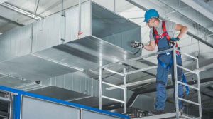 HVAC technical worker checking the ventilation system 