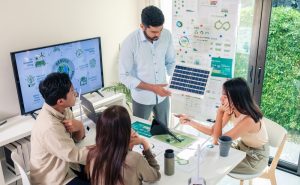 Business leaders reviewing ESG carbon data to identify facilities management profit opportunities